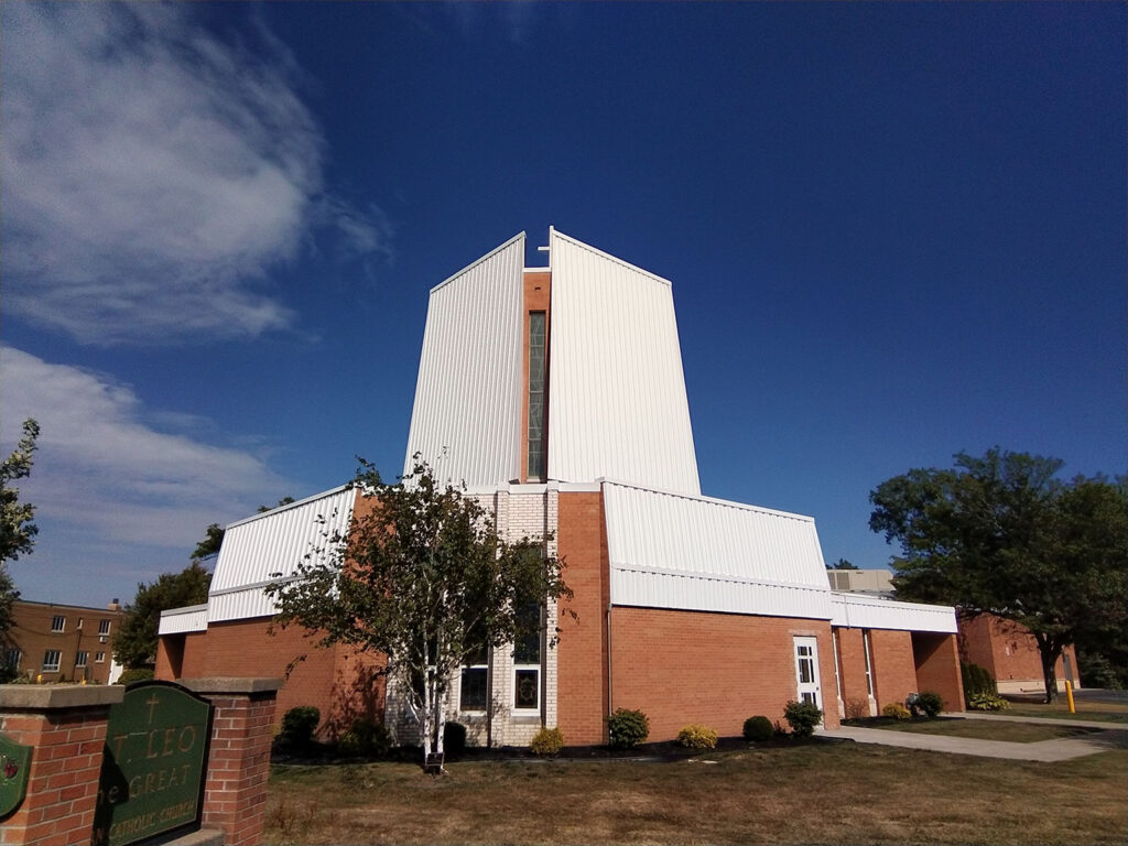 Modern architectural church building with white and brick design
