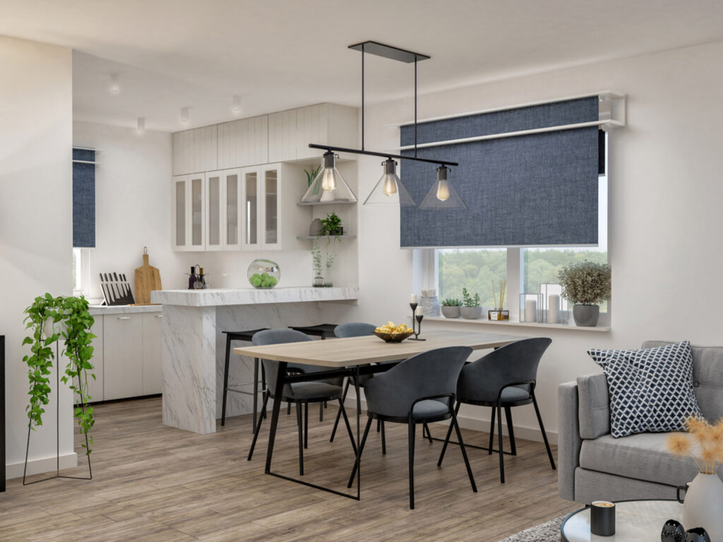 Modern kitchen and dining area with stylish decor and marble countertop.